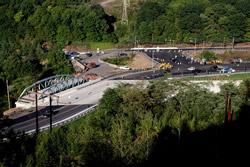 Overhead view of the bridge near completion, with the existing bridge still in place. The new bridge is wider and the alignment smoother to provide for a better flow of traffic.