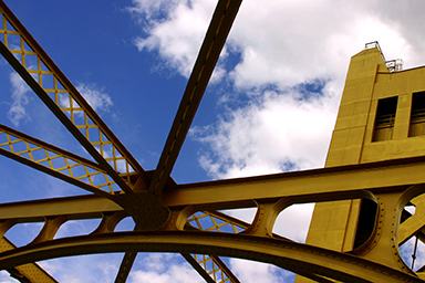 Chapter 1 uses a photograph to represent the idea that asset management can provide a framework for transportation agencies to manage their resources, both their physical resources and also their human and informational resources.