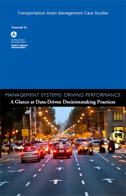 Image. The front cover of Management Systems: Driving Performance. Beneath the title bar a picture shows traffic stationary on a one way street.
