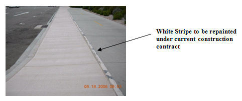 (Photo of white strip alongside road) - White Stripe to be repainted under current construction contract