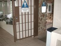 Photo depicting: Entry gates on the restrooms 10" high kick plate