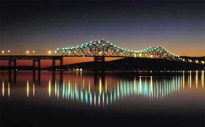 Photo: Illuminated bridge at sunset