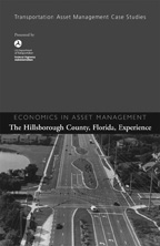 Figure 11. Photo. Display of brochure. Cover of Economics in Asset Management: The Hillsborough County, Florida, Experience.
