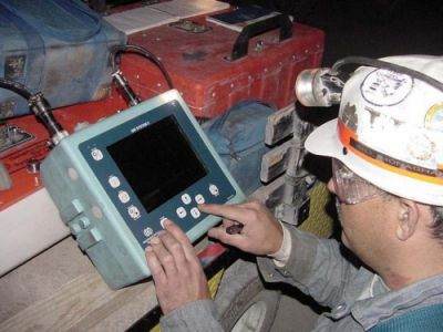 Photo of Engineer using the SIR-2 System