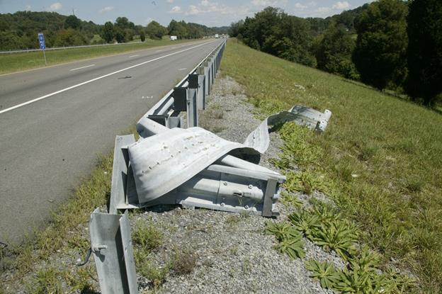 Appendix E –examples of crash cases not forwarded for review by task force Phase 2A Case #125; Photo damaged guardrail did not contain sufficient information to identify vital information.