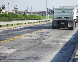 Dump truck on deteriorated roadway
