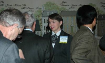 Mary Lou Ralls (center) engaged in conversation