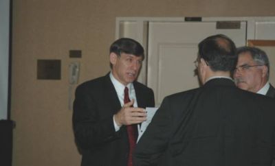 Rick Capka (left) and Gary Hoffman (right) discussed the program with an audience member