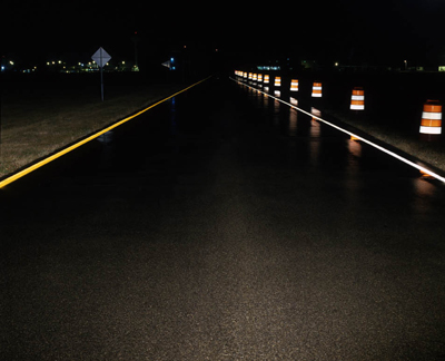 All-weather pavement markings under wet conditions.