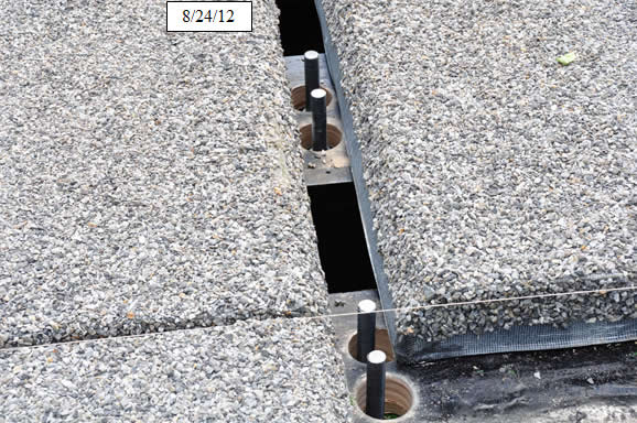 Figure 20. Photo. Install fixed connection between deck and steel stringers per plan.
