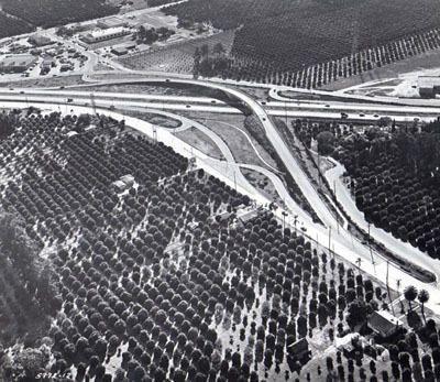 Santa Ana Freeway, looking northeasterly toward Los Angeles Street interchange (three-quad modified diamond interchange) California Department of Public Works photo.