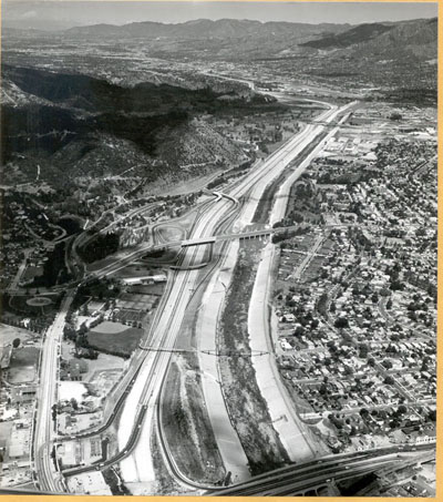 California - Looking northwesterly along Golden State Freeway with the Las Feliz Boulevard interchange in the center of the picture.  The cities of Burbank and Glendale are in the background.  May 12, 1959.