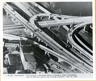 Connecticut - I-91-3(15)38 - Interstate Route 91 - Founders Bridge interchange in Hartford.  Aerial view looking northeast.  Nov. 26, 1958