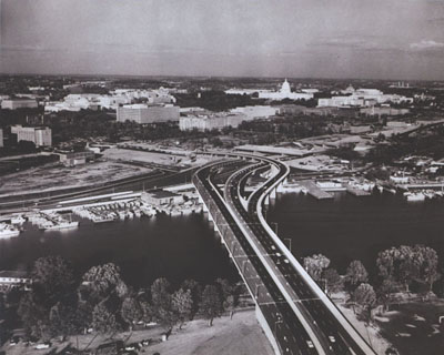 Washington, D.C. - Interstate Route 95 [now I-395] carries 52,000 vehicles daily into and out of Washington, D.C., not far from the Nation's Capitol.  Presently blocked-off lanes will connect with the inner loop, I-295, seen here under construction