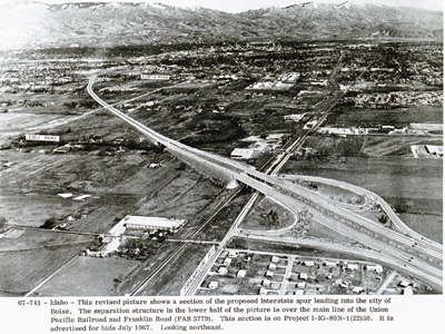 Idaho - This revised picture shows a section of the proposed Interstate spur leading into the city of Boise.  The separation structure in the lower half of the picture is over the main line of the Union Pacific Railroad and Franklin Road (FAS 3779).  This section is on Project I-IG-80N-1(22)50, now Inerstate 184.  It is advertised for bids July 1967.  Looking northeast.