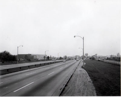 Interstate 94 (Edens Expressway) View of Edens Expressway showing commercial development left and residential section right.  Looking N.W. between Touchy Ave. and Oakton Street.  Chicago Illinois.