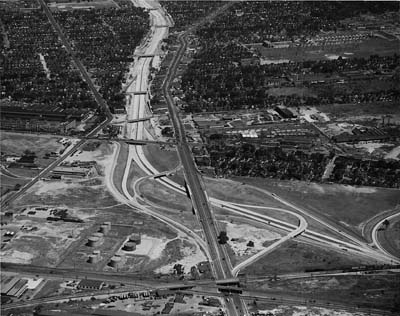 Ford Expressway.  Michigan Avenue interchange in foreground.  McGraw Ave on left and Michigan Avenue on right of Ford Expressway.  Wyo ming Ave is under RR track crossing and intersects Mich Ave at grade in foreground
