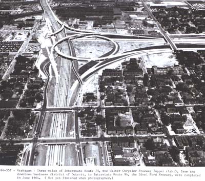 Three mile of Interstate Route 75, the Walter Chrysler Freeway (upper right), from the downtown business district of Detroit, to Interstate Route 94, the Edsel Ford Freeway, were completed in June 1964.  (Not yet finished when photographed.)