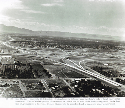 New Mexico - Interstate 25/Interstate 40 interchange in Albuquerque, the State's only tri-level interchange structure.  The unfinished portion of Interstate 40, which can be seen in the lower foreground, is the last link of Albuquerque's Interstate System to be completed and is presently under construction.