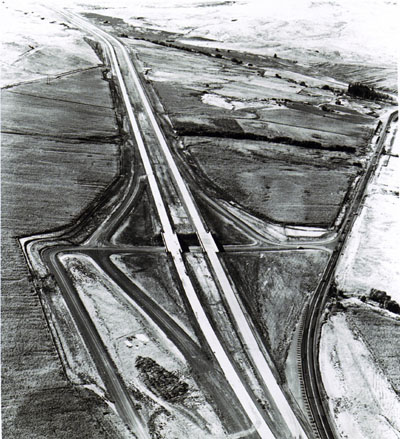Oregon- Looking northwest at Farewell Bend Interchange on newly constructed portion of I-84 in Eastern Oregon.  Old U.S. 30 is shown on the right.
