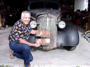 Steve Hachenberger shows the historic 1936 plates in front of his 1936 Chevrolet 5-Window Master Coupe, May 2008. Photo, courtesy of Steve Hachenberger.