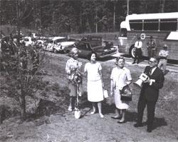 Left to right, at planting of dogwood tree along I-95 in Virginia, Muriel Humphrey, wife of Vice President Hubert H. Humphrey, Lady Bird Johnson, unidentified woman, and Federal Highway Administrator Rex Whitton.
