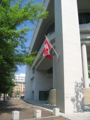 The Maple Leaf flag of Canada flutters in the wind on the Canadian Embassy on Pennsylvania Avenue.