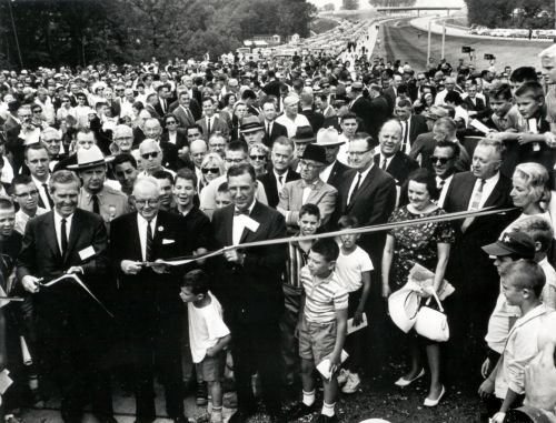 In Maryland, the final link in I-495, the Capital Beltway, was opened after ceremonies on August 17, 1964.  Ribbon cutters (l. to r) are Rex Whitton, Governor J. Millard Tawes, and Chairman John B. Funk of the Maryland State Roads Commission.