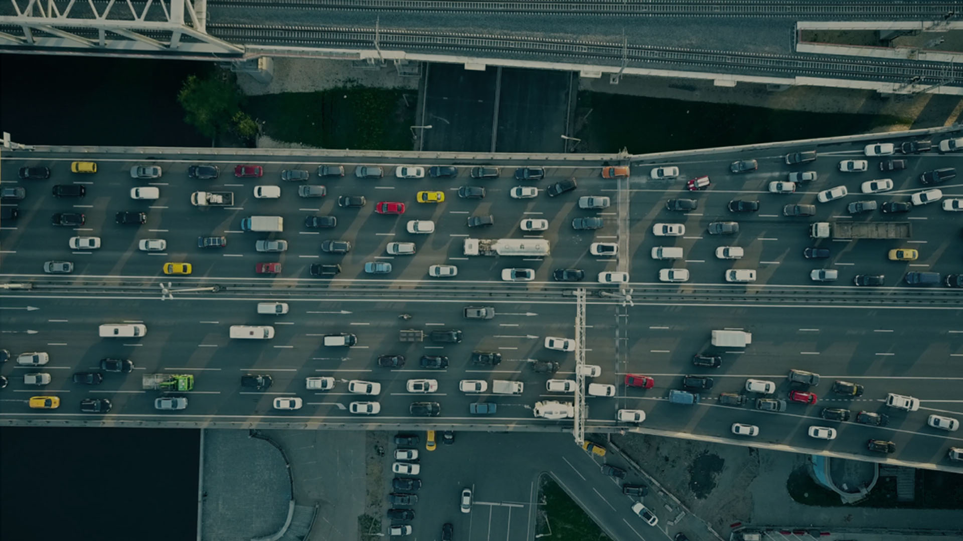 Overhead photo of traffic jam on a bridge.