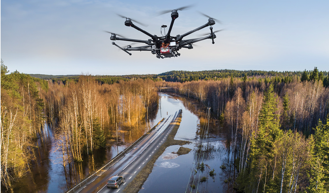 Photo of a drone making observations on a flooded highway