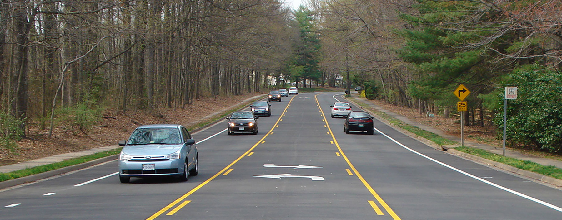 Two lane road with middle turn lanes