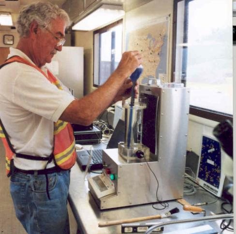 Photo of air void analyzer being prepared for testing