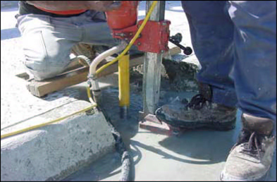 Figure 16. They used water to clean the holes and avoid over heating of the driller.
