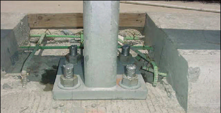 Figure 25. Duct tape application for prevent damage of the anchor bolts. The reinforced steel bars were left cut as shown.