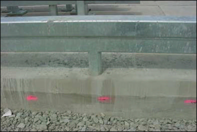 Figure 36. Finished curb and concrete sidewalks for the sections of the approach slab