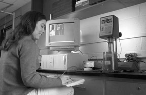 Woman sitting at computer