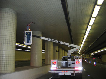 The Virginia Avenue tunnel over I-66 is inspected for delaminated areas.