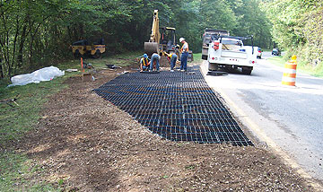 Geoblocks are installed and cut to fit a roadway pulloff area in Tennessee's Great Smoky Mountains National Park.