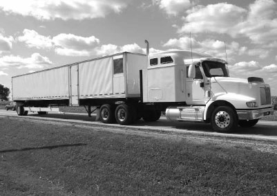 A photo of a tractor-trailer.
