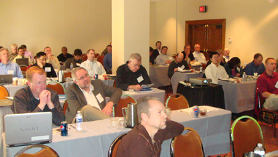 Figure 4. Photo. Participants listen to a presentation at FHWA's Life Cycle Cost Analysis Technical Forum, held in St. Louis, Missouri, on April 21, 2009.