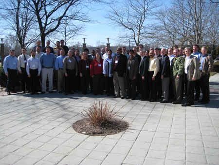 A group shot of approximately 40 participants standing outside at the Construction Peer Network's first peer exchange, held March 6-7, 2012, in Warwick, RI.