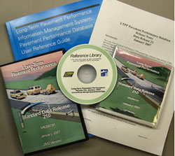Photograph of the contents of the Standard Data Release number 21 package, including D V D, C D, and documentation.
