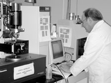 TFHRC researcher using laboratory equipment.