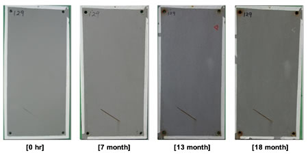 Figure 38. Photo. Progressive changes of panel 129 (HRCSA: NWS). This figure shows a series of photos of scribed high-ratio calcium sulfonate alkyd (HRCSA) panel 129 at time periods of 0, 7, 13, and 18 months of natural weathering exposure with salt spray (NWS). A holiday developed on the surface after 13 months of exposure. Rust creepage growth appears to be minimal or zero for all time periods.