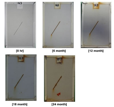 Figure 41. Photo. Progressive changes of panel 163 (HBAC: ME). This figure shows a series of photos of scribed high-build waterborne acrylic (HBAC) panel 163 at time periods of 0, 6, 12, 18, and 24 months of marine exposure (ME). The photos do not show any holidays or surface deterioration until 18 months, and two holidays appeared at the end of test period. Rust creepage growth appears to be minimal or zero for all time periods.