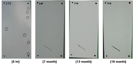 Figure 50. Photo. Progressive changes of panel 226 (SLX: NW).This figure shows a series of photos of scribed polysiloxane (SLX) panel 226 at time periods of 0, 7, 13, and 18 months of natural weathering (NW) exposure. The test panel initially had 7 defects and did not increase through the rest of the test period. Rust creepage growth appears to be minimal or zero for all time periods.