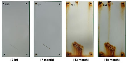 Figure 51. Photo. Progressive changes of panel 232 (SLX: NWS).  This figure shows a series of photos of scribed polysiloxane (SLX) panel 232 at time periods of 0, 7, 13, and 18 months of natural weathering exposure with salt spray (NWS). The photos do not show any holidays or surface deterioration. Rust creepage started to grow at 13 months and continued through the rest of the test period, with rusting around the scribed area and at the bottom edges.