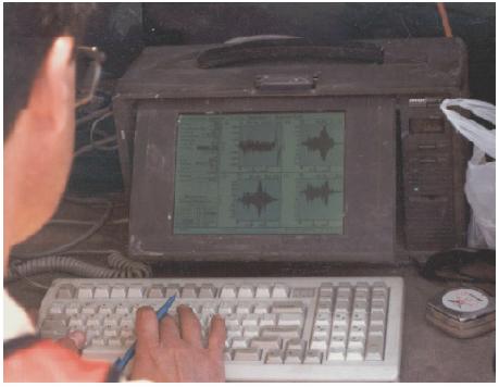 DP420 Dynamic Signal Analyzer in portable PC. This image shows the type of portable field computer used as the data acquisition system for the project. Test data were recorded and saved in the field on the hard drive of the computer, which was linked with the vibrator and seismic accelerometers by lead cables. 