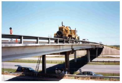 Vibroseis truck over west pier of Woodville Road Bridge. This image shows a Vibroseis truck parked over a bent in the eastbound lane on the deck of the Woodville Road Bridge.