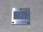 Figure 33. Photo. Calibration surface plate on top of base plate. This figure shows a photograph of the calibration surface plate placed on top of the base plate.